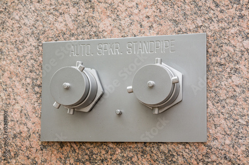 Auto Sprinkler standpipe on marble wall
