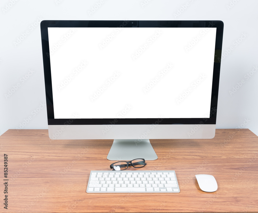Office monitor computer, mouse on wooden table