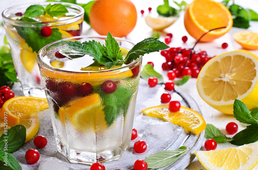 Drink with citrus and berries Drink with citrus and berries