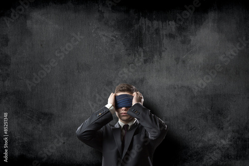 Blindfold businessman