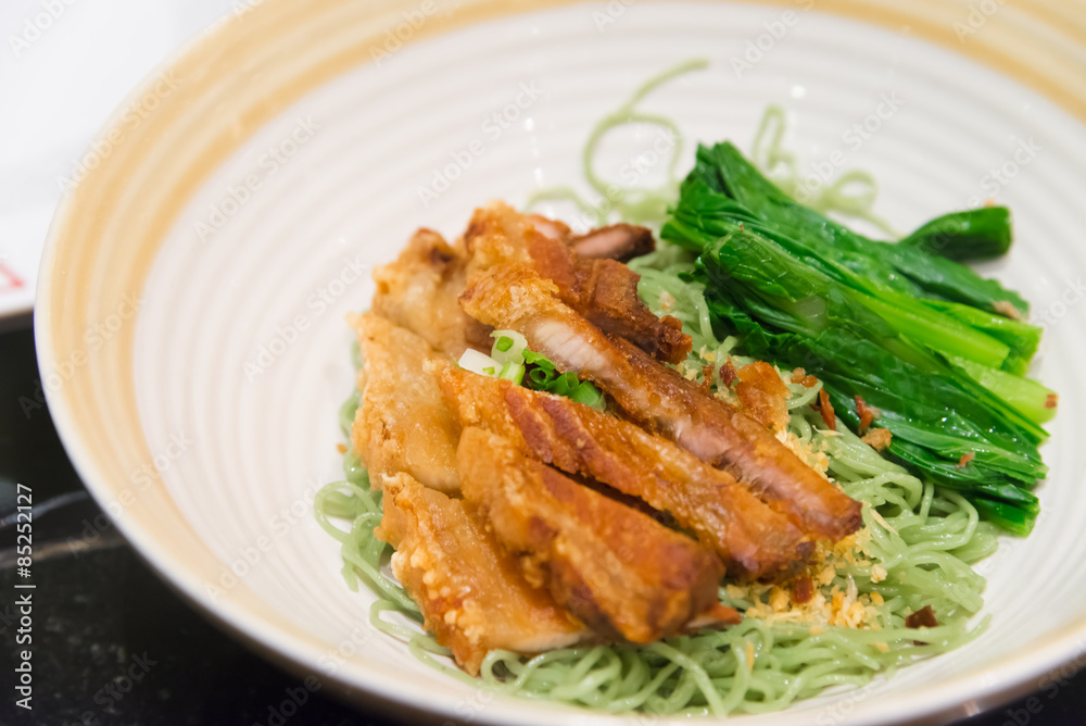 Jade noodle with crispy fried pork chinese hongkong tradition f Jade noodle with crispy fried pork chinese hongkong tradition f