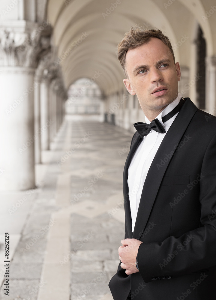 Vertical photo of man in tuxedo Vertical photo of man in tuxedo