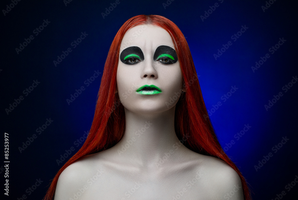 girl green makeup red hair blue background girl green makeup red hair blue background