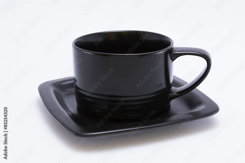 black cup and saucer isolated on white background black cup and saucer isolated on white background