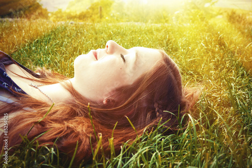 Girl enjoy the warm sun photo