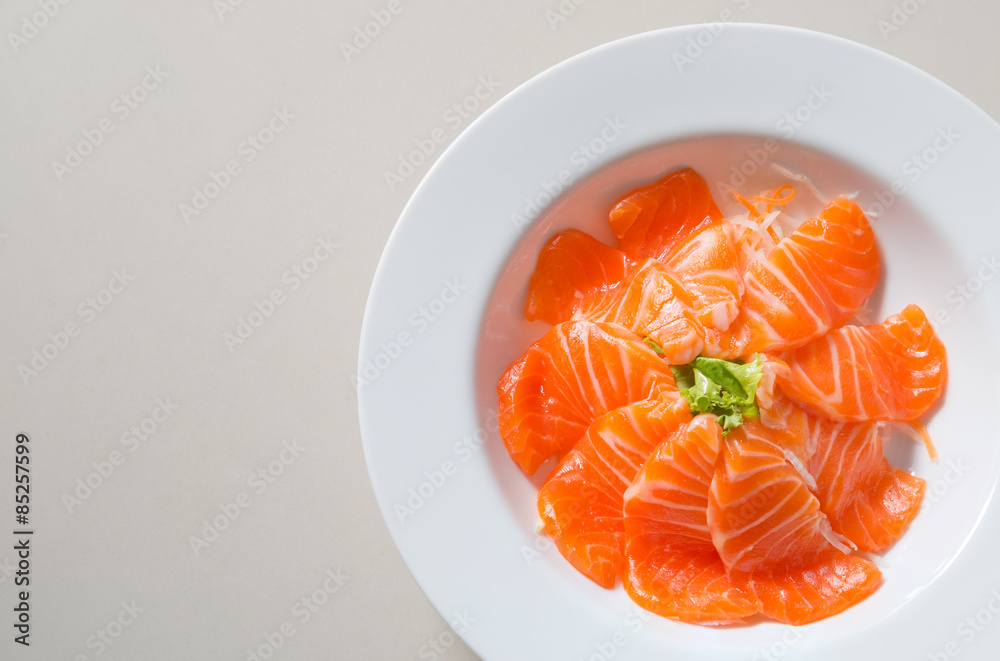 fresh sashimi saimon on white dish background fresh sashimi saimon on white dish background
