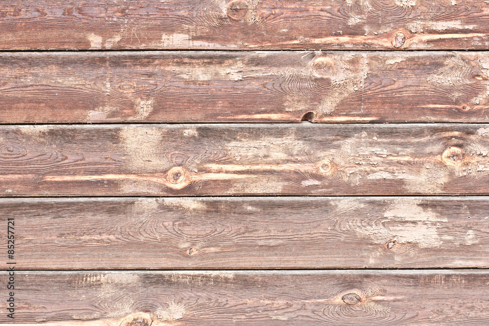 Naklejka premium Brown peeling paint wooden desk texture.