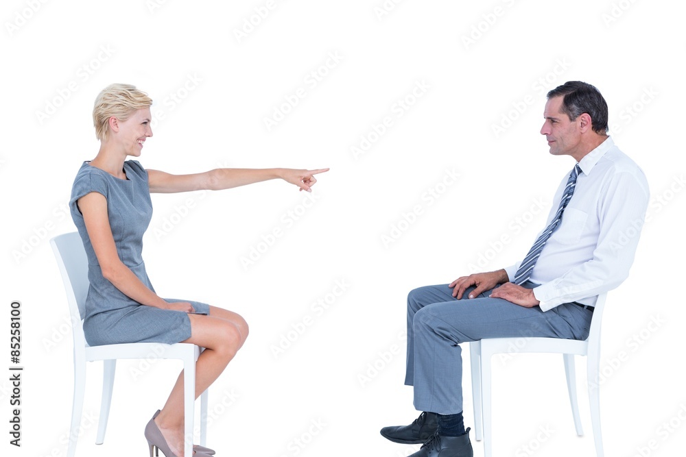 Obraz premium businesswoman pointing at businessman