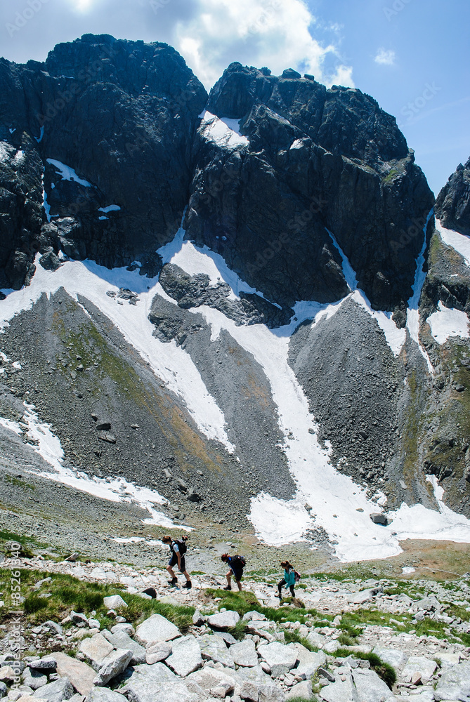 Trekkers on the path in Tatra mountains