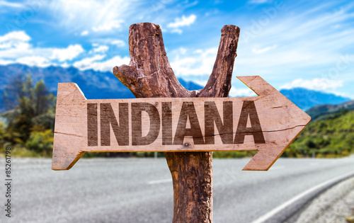 Indiana wooden sign with road background photo