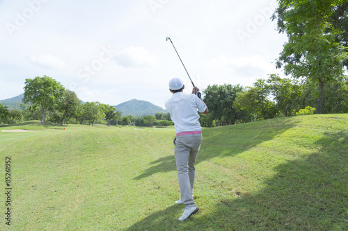 widely golf course in very nice day summer with player