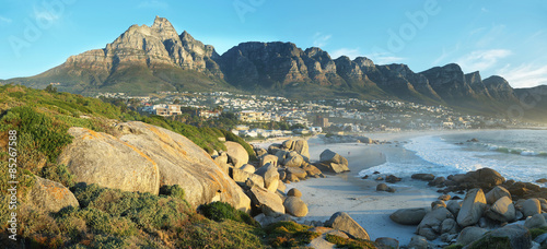 Camps Bay Beach in Cape Town, South Africa, with the Twelve Apostles in the background.