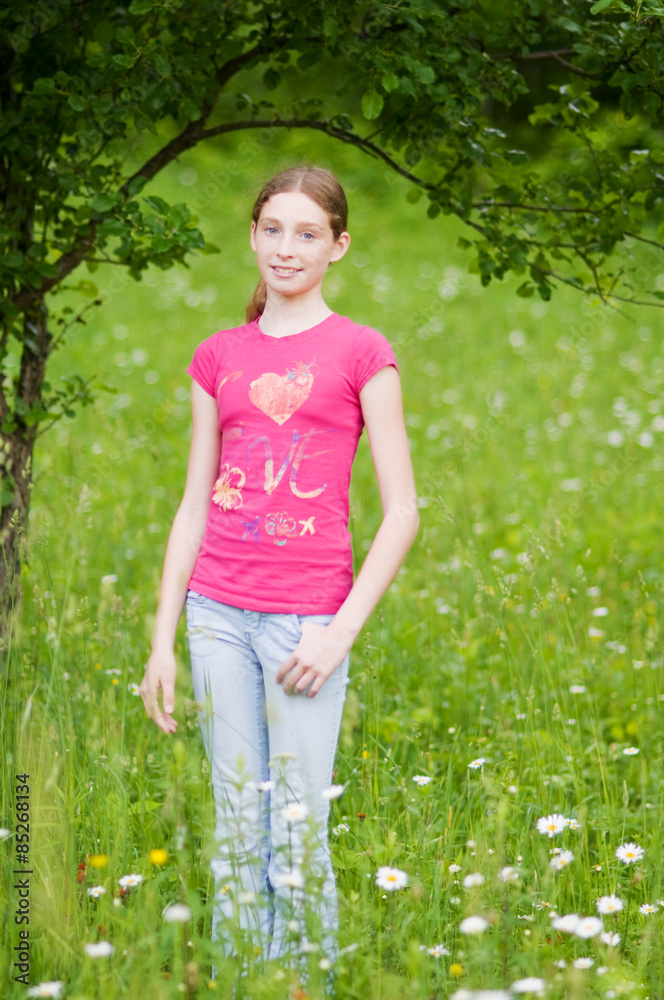 teen girl in a meadow 