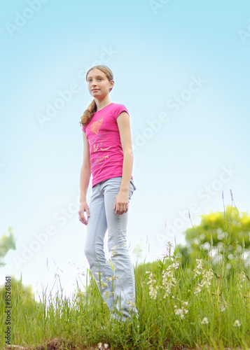 teenage girl in a wildflower meadow
