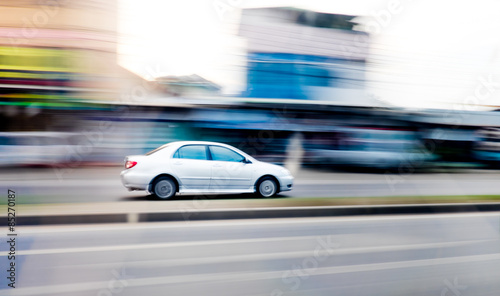 Motion blur background : car running on road ,blurred background