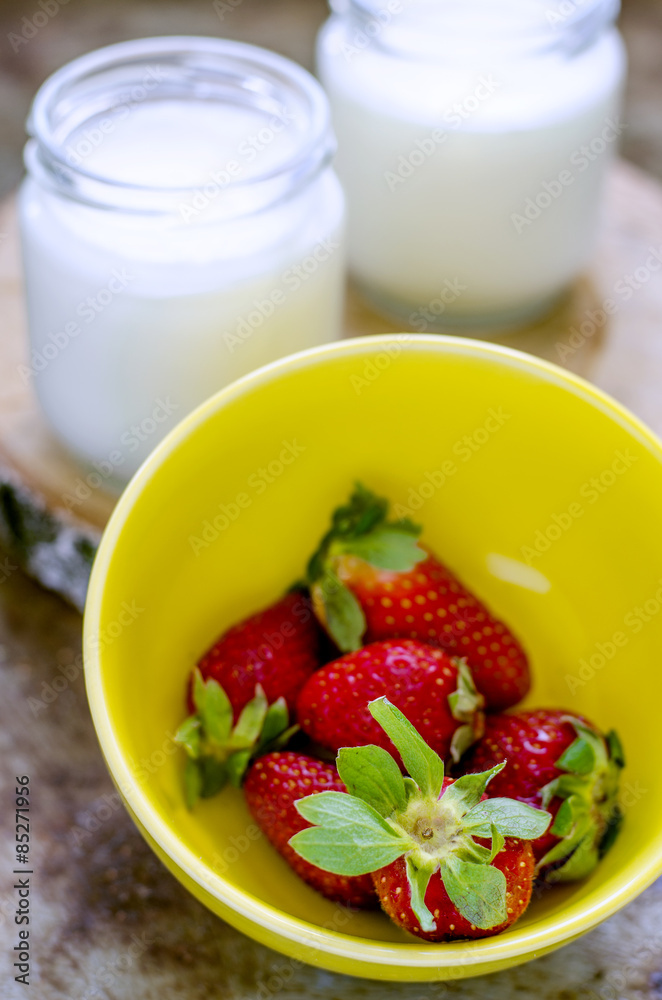 fresh strawberries and fresh yoghurt in a glass fresh strawberries and fresh yoghurt in a glass