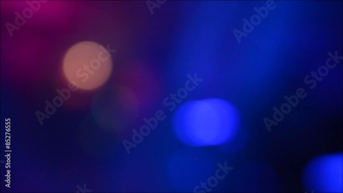 Abstract pattern of circles of blue and red light
