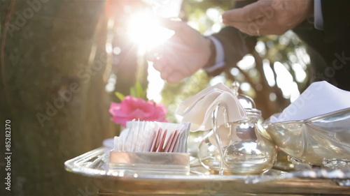 Serving breakfast outdoor in a sunny morning with elegance