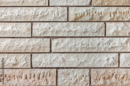 texture of yellow-brown rough brick wall