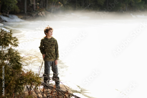 boy by a misty lake © sianc