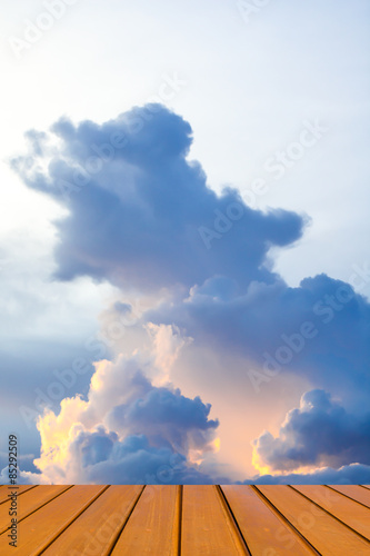 clear blue sky and cloud with wood perspective background.