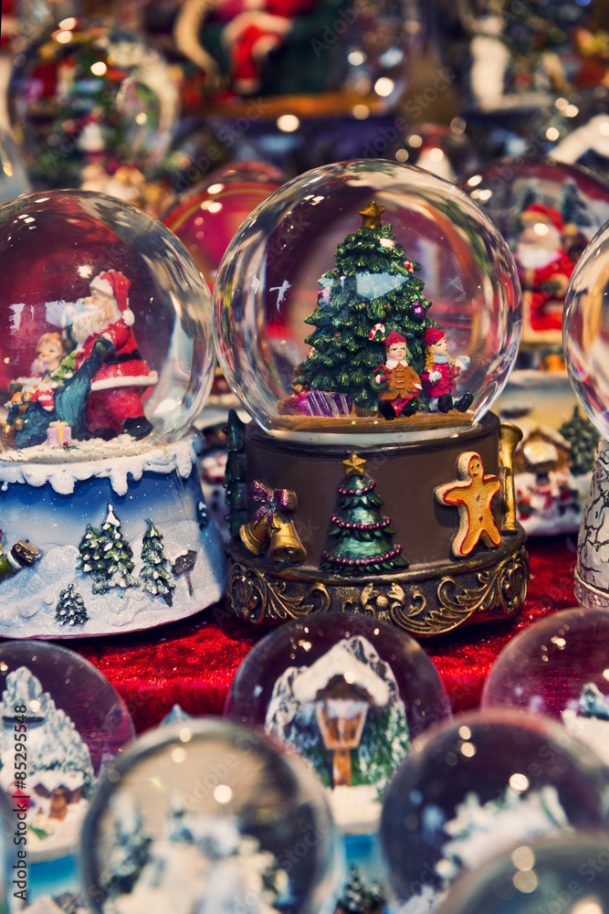 Beautiful Christmas snow globes at the Christmas market in the city, Germany Beautiful Christmas snow globes at the Christmas market in the city, Germany