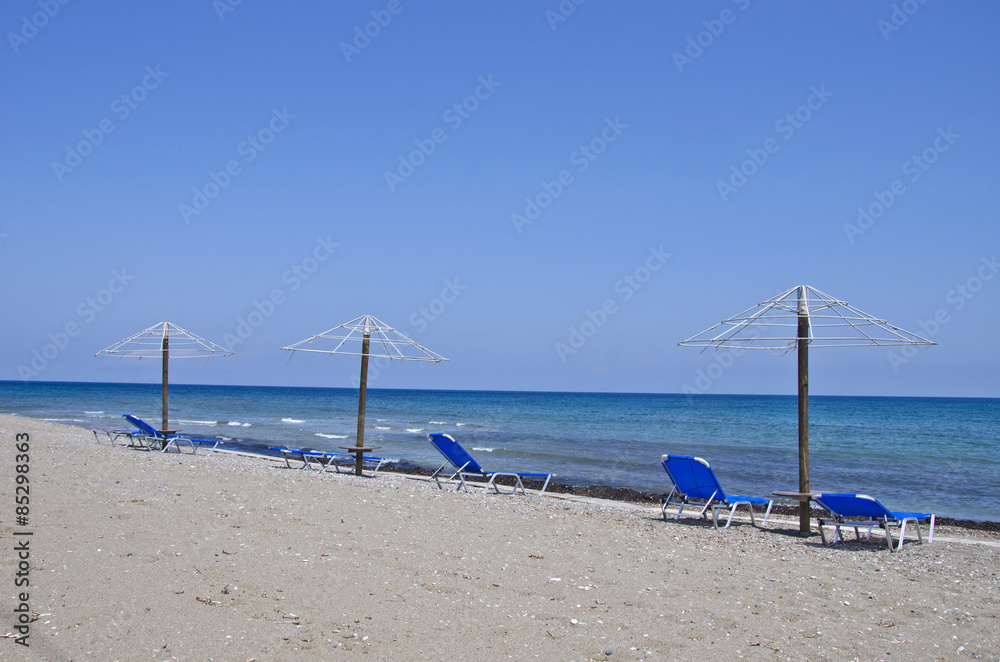 beautiful empty Aegean sea beach in Rhodes island, Greece