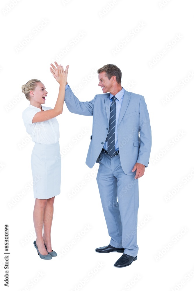 businessman and businesswoman greeting each other 