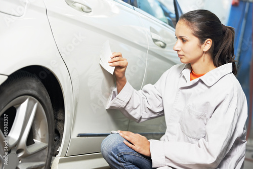 auto mechanic colourist matching color photo