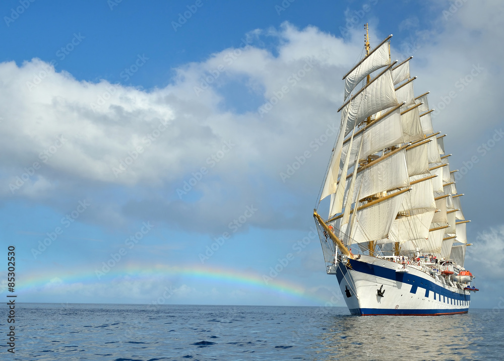Fototapeta premium Sailing ship on the background of the rainbow
