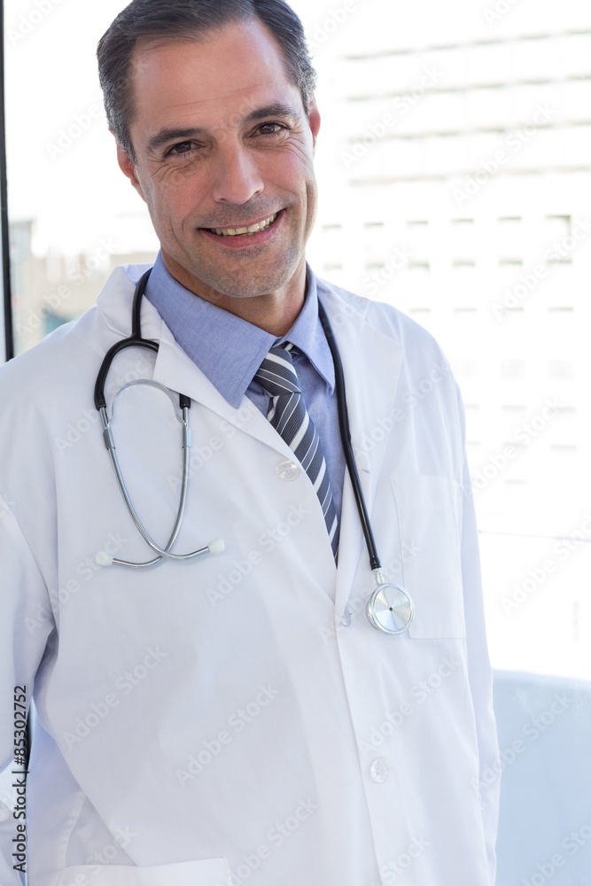 Smiling doctor looking at camera Smiling doctor looking at camera