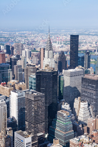 New York  panoramic view of Midtown Manhattan as seen from the Empire State Building observation deck  in the center of the framing the Chrysler Building