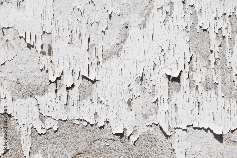 Obraz premium Vintage flakes of old white paint on grey concrete wall