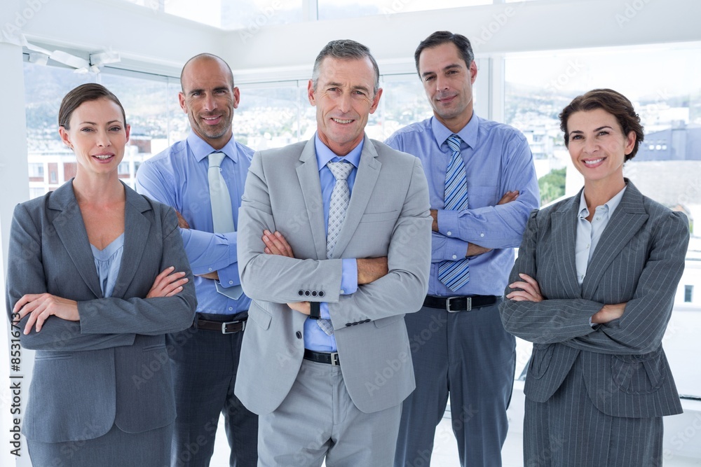 Business team working happily together on laptop Business team working happily together on laptop