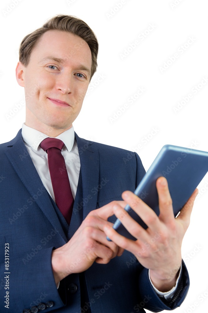 Businessman using his tablet computer Businessman using his tablet computer