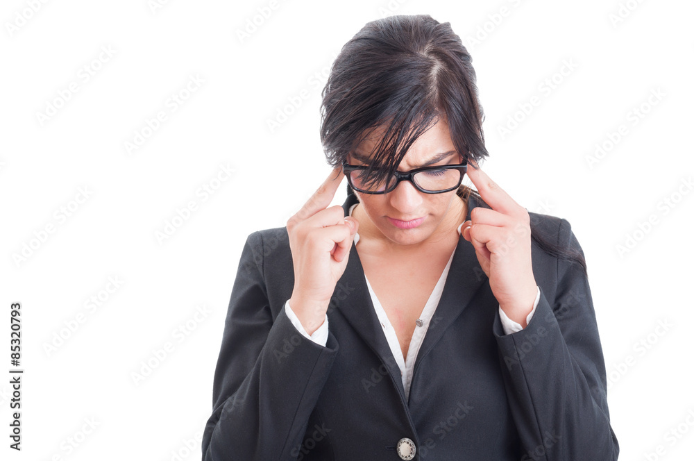 Stressed business woman having a headache