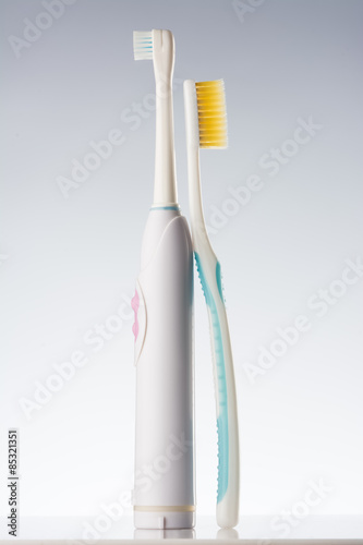 Electric toothbrush and usual toothbrush.