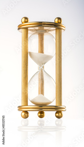 Sand watch with gold column.
