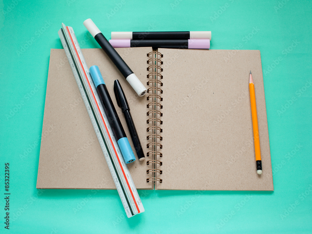 Brown blank sketch book and stationary office for sketching Brown blank sketch book and stationary office for sketching
