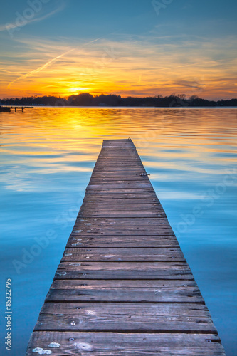 Fototapeta Naklejka Na Ścianę i Meble -  Sunset reflecting in the Tranquil Waters of Lake Paterswoldeseme