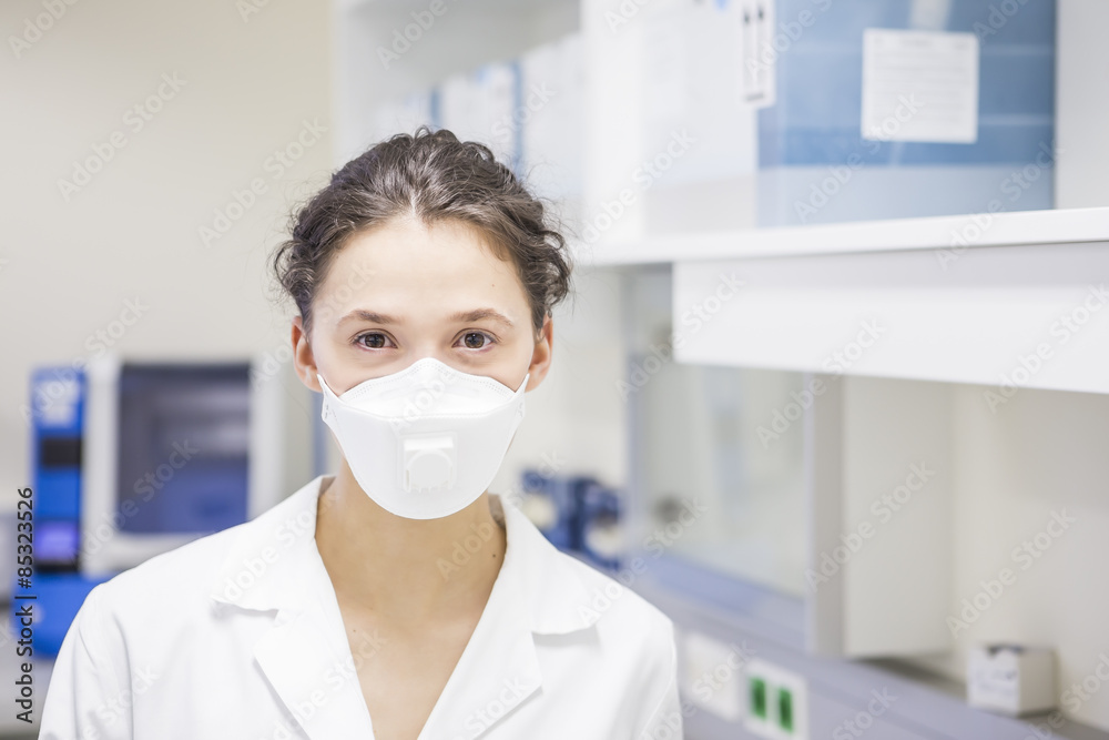 Portrait of young lab technician wearing a mask Portrait of young lab technician wearing a mask