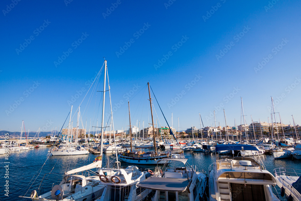 Sea bay with yachts.  Fishing boats in the harbour
