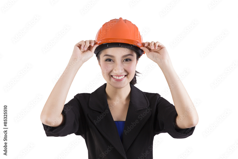 Female engineer touching safty helmet on a white background Female engineer touching safty helmet on a white background