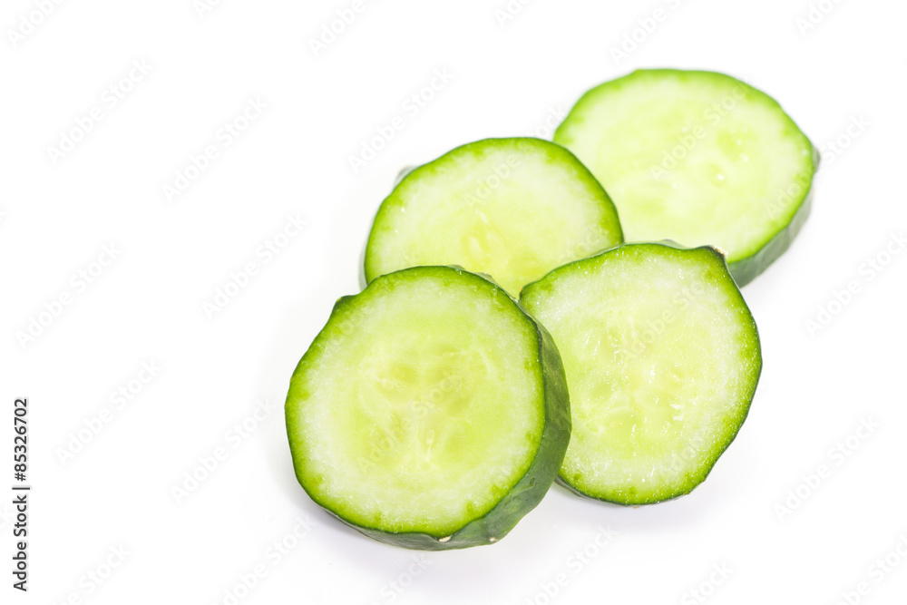 Fresh cucumber slice isolated on white background Fresh cucumber slice isolated on white background