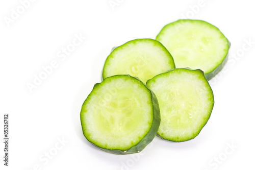 Fresh cucumber slice isolated on white background