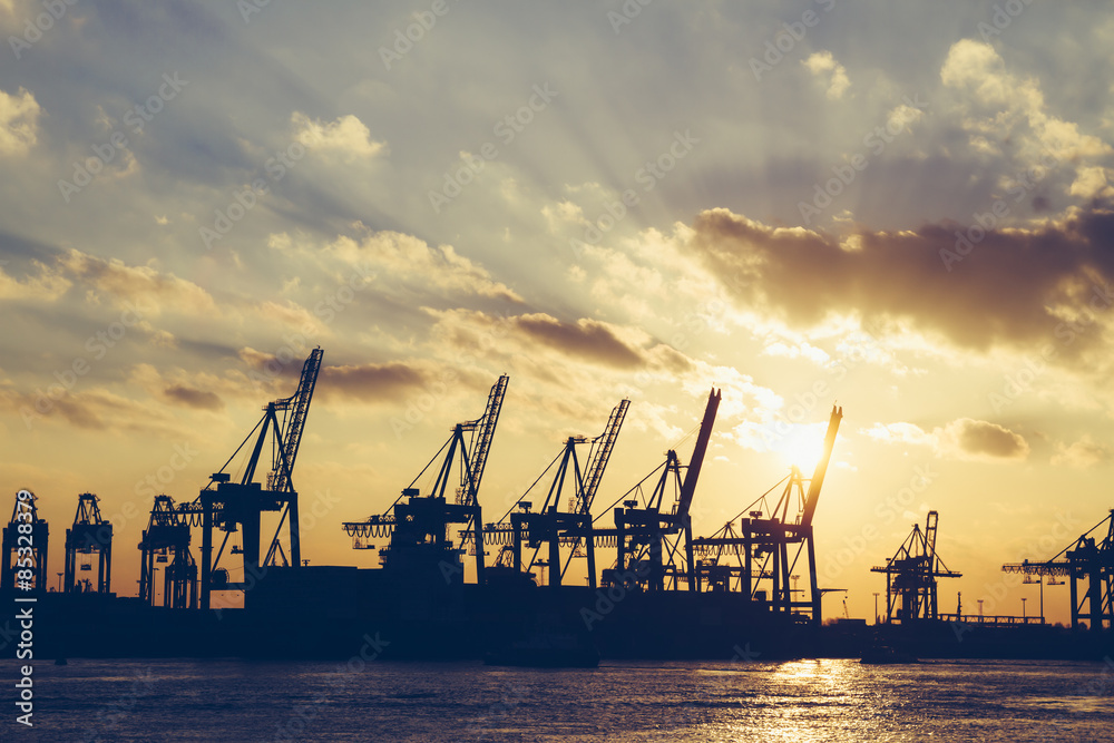 Germany, Hamburg, container cranes at sunset Germany, Hamburg, container cranes at sunset