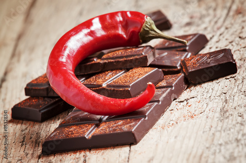 Chopped dark chocolate, red chili pepper and red pepper, selecti photo