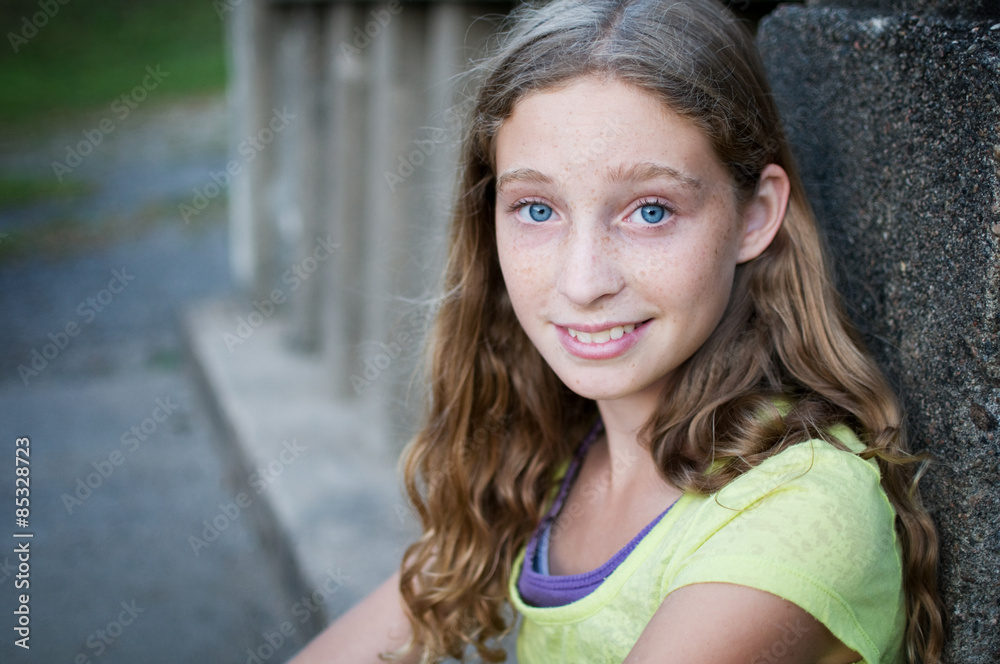 close up of pretty blue eyed teen girl close up of pretty blue eyed teen girl