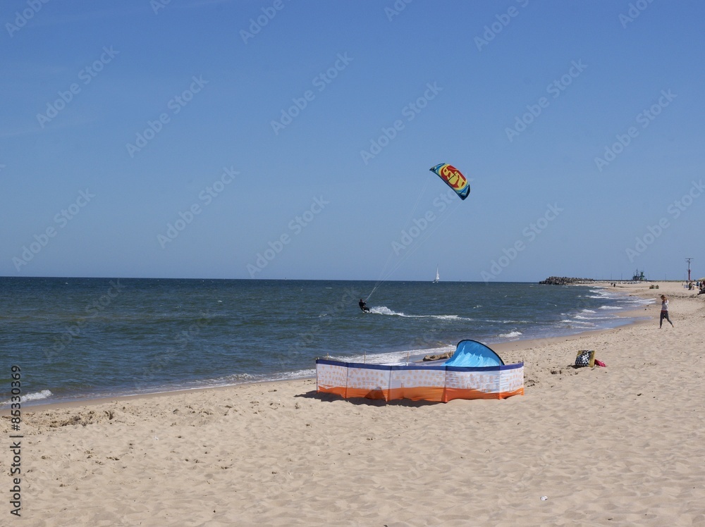 kitesurfer and Baltic sea beach near Wladyslawowo 