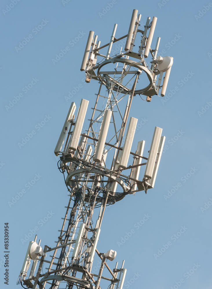 communications tower against a blue sky communications tower against a blue sky
